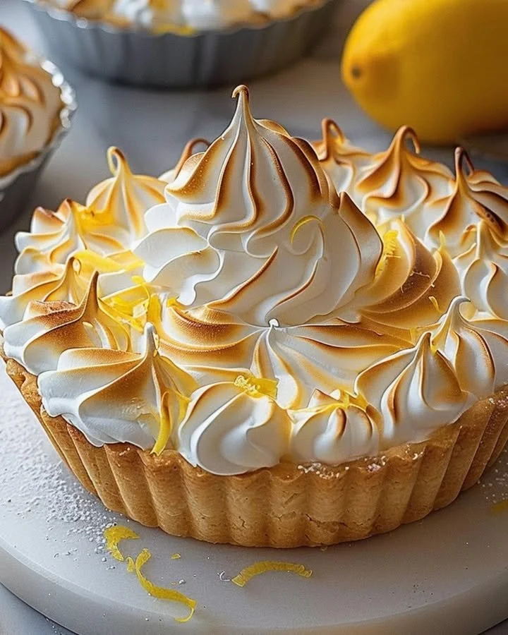 Freshly baked Lemon Meringue Tart with fluffy meringue topping and lemon filling