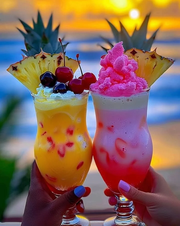 Colorful Rainbow Sherbet Piña Colada cocktail with tropical garnishes
