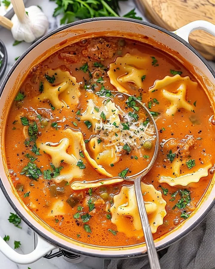 One pot ravioli soup with fresh ingredients in a bowl