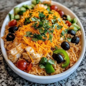 Cheesy Chicken Enchilada Rice Bake topped with melted cheese and cilantro
