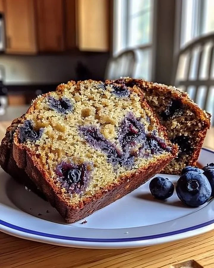 Moist blueberry banana bread fresh out of the oven, delicious and inviting.
